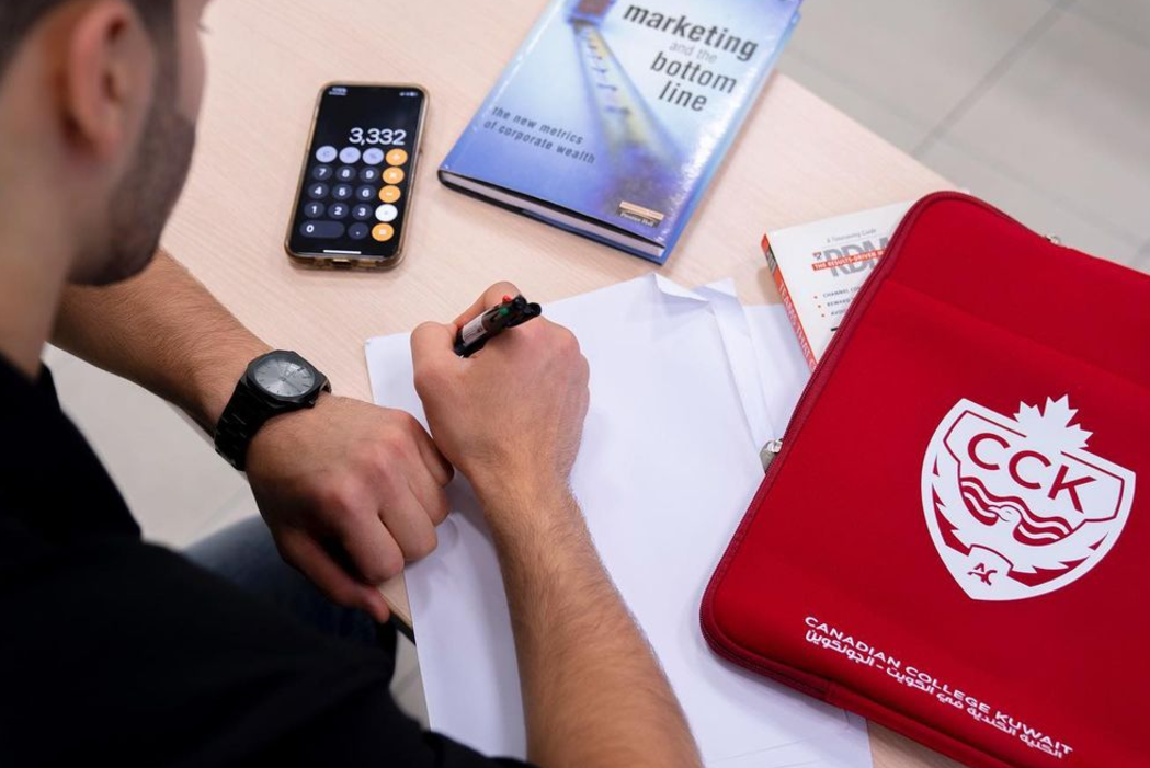 CCK College student engaged in studying and academic work.