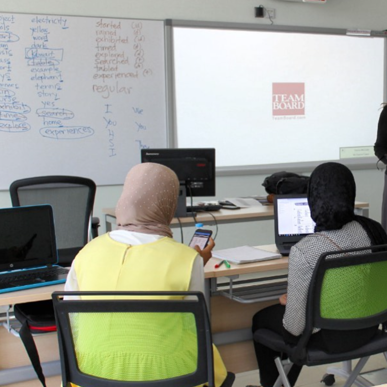 Students attending a lecture at CCK, focused on learning in a classroom setting.